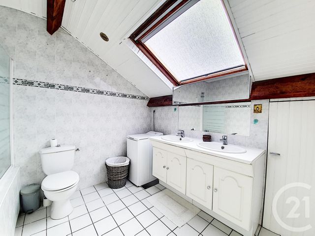 Afficher la photo en grand Appartement Duplex à vendre - 5 pièces - 91.67 m2 - ASNIERES SUR SEINE - 92 - ILE-DE-FRANCE - Century 21 Beaurepaire